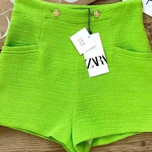 Green tweed shorts